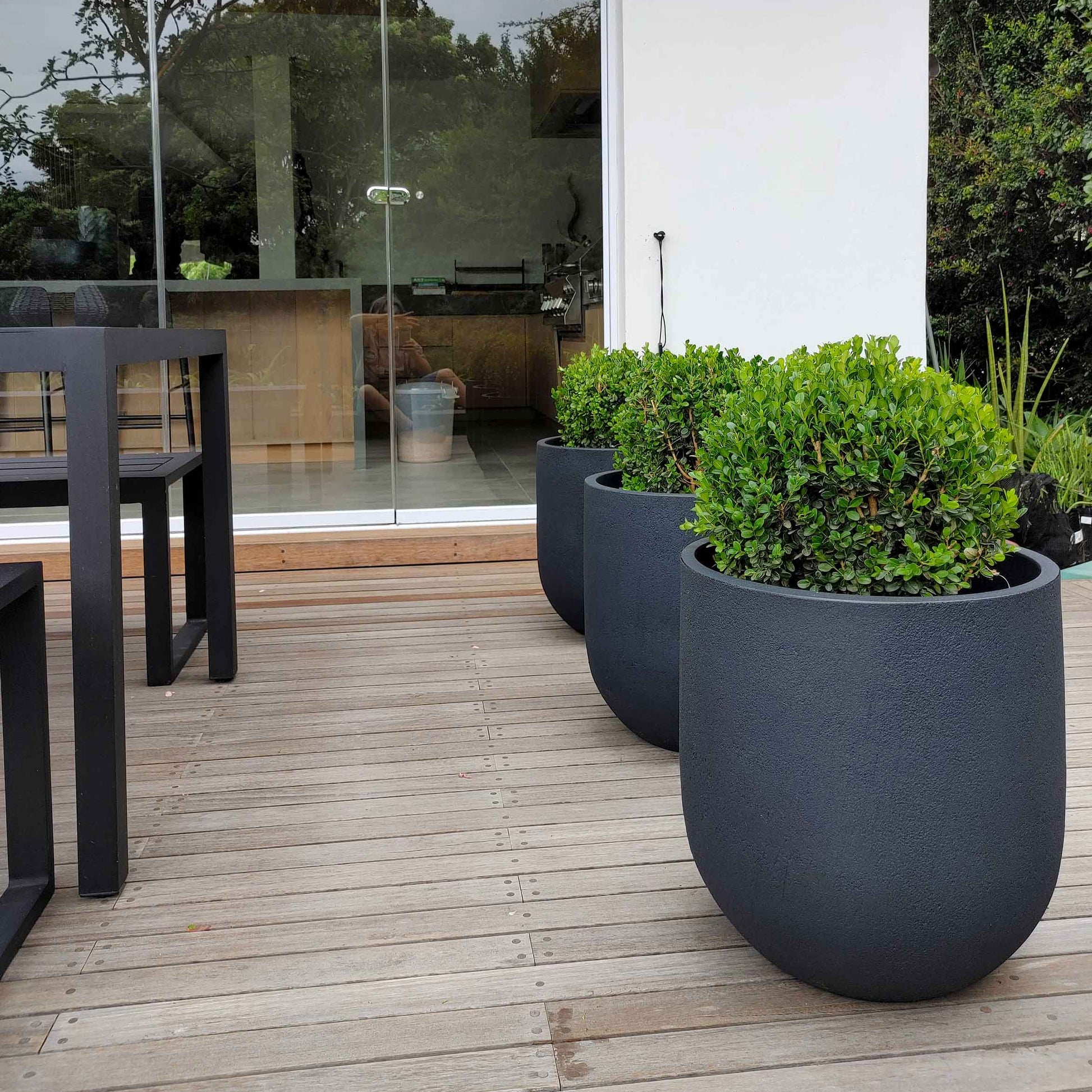 Showcase photograph of the Rustic Cask Japi Planter. On trend, Most popular. Upright planters. Lightweight poly carbon. Stylish