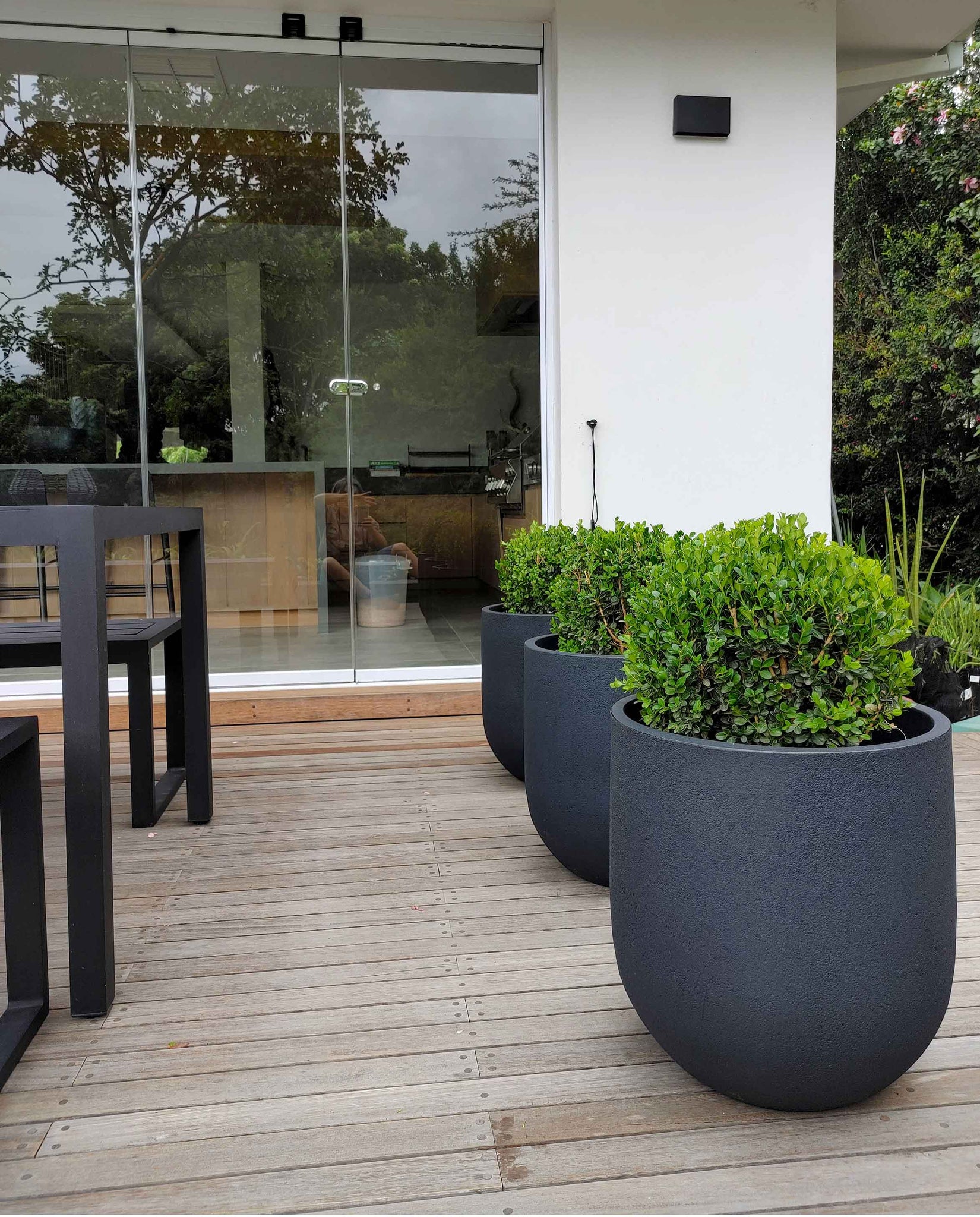 Showcase photograph of the Rustic Cask Japi Planter. On trend, Most popular. Upright planters. Lightweight poly carbon. Stylish