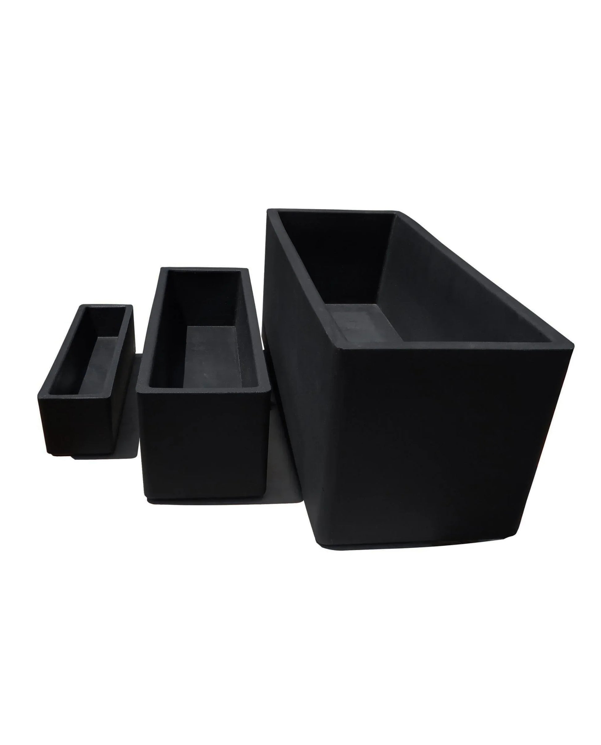Three Flat Japi Window Box - Double Walled planters by Florastyle By Hingham, in three sizes, are arranged left to right from smallest to largest. All are lightweight, black, rectangular, and displayed against a white background.